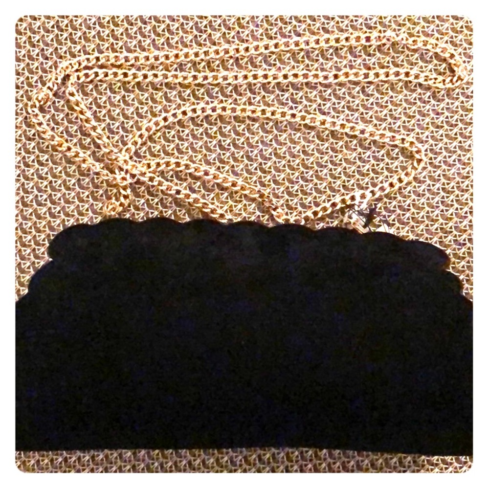Kid suede scallop- edge handbag